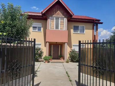 Casa cu teren de 1000mp